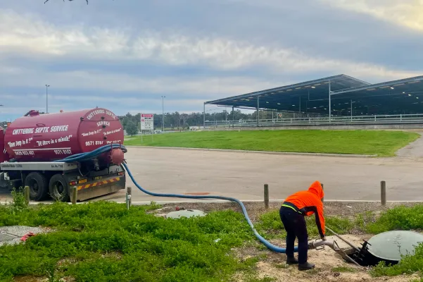Chittering Septic Service vacuum tanker pumping out a septic tank on a rural property